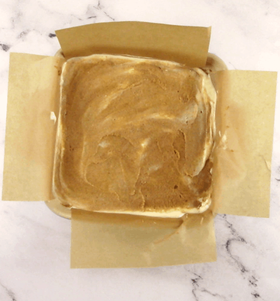 pumpkin coffee cake batter layered in pan