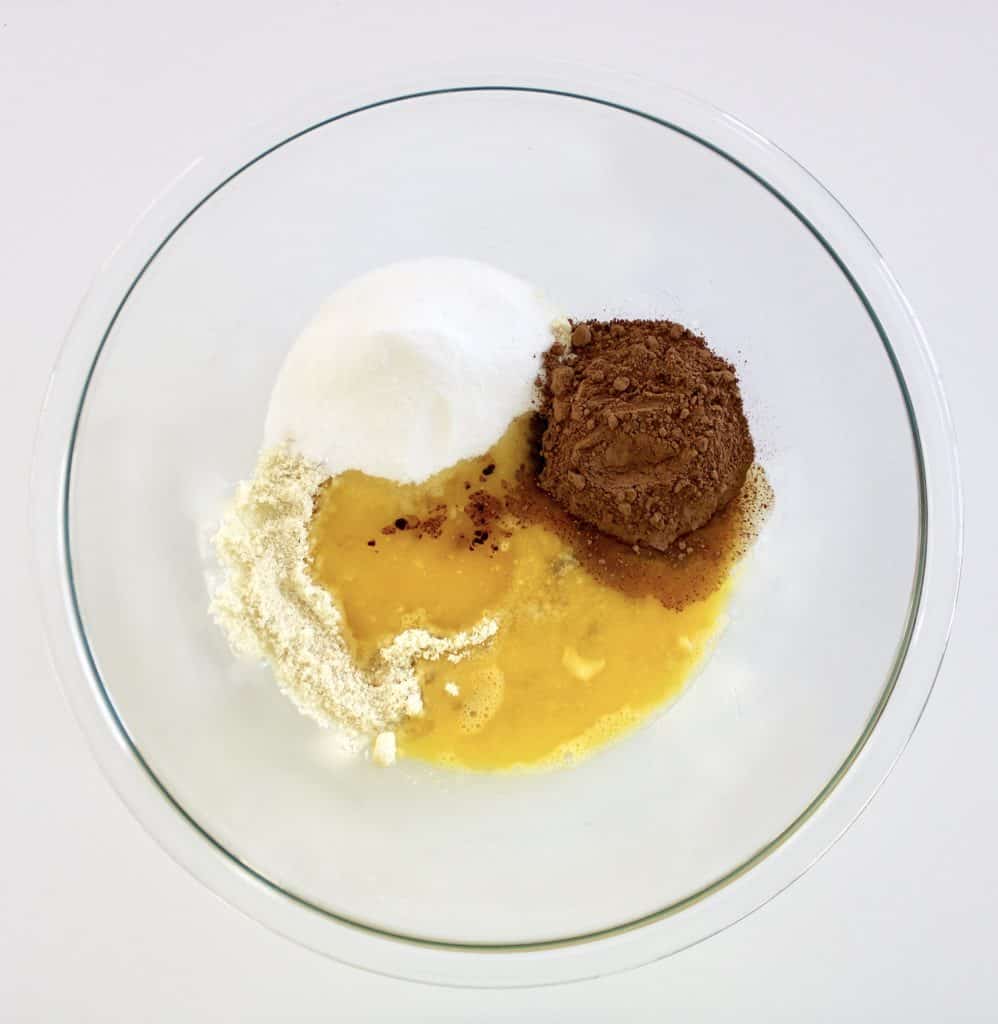  chocolate crust ingredients in glass bowl unmixed