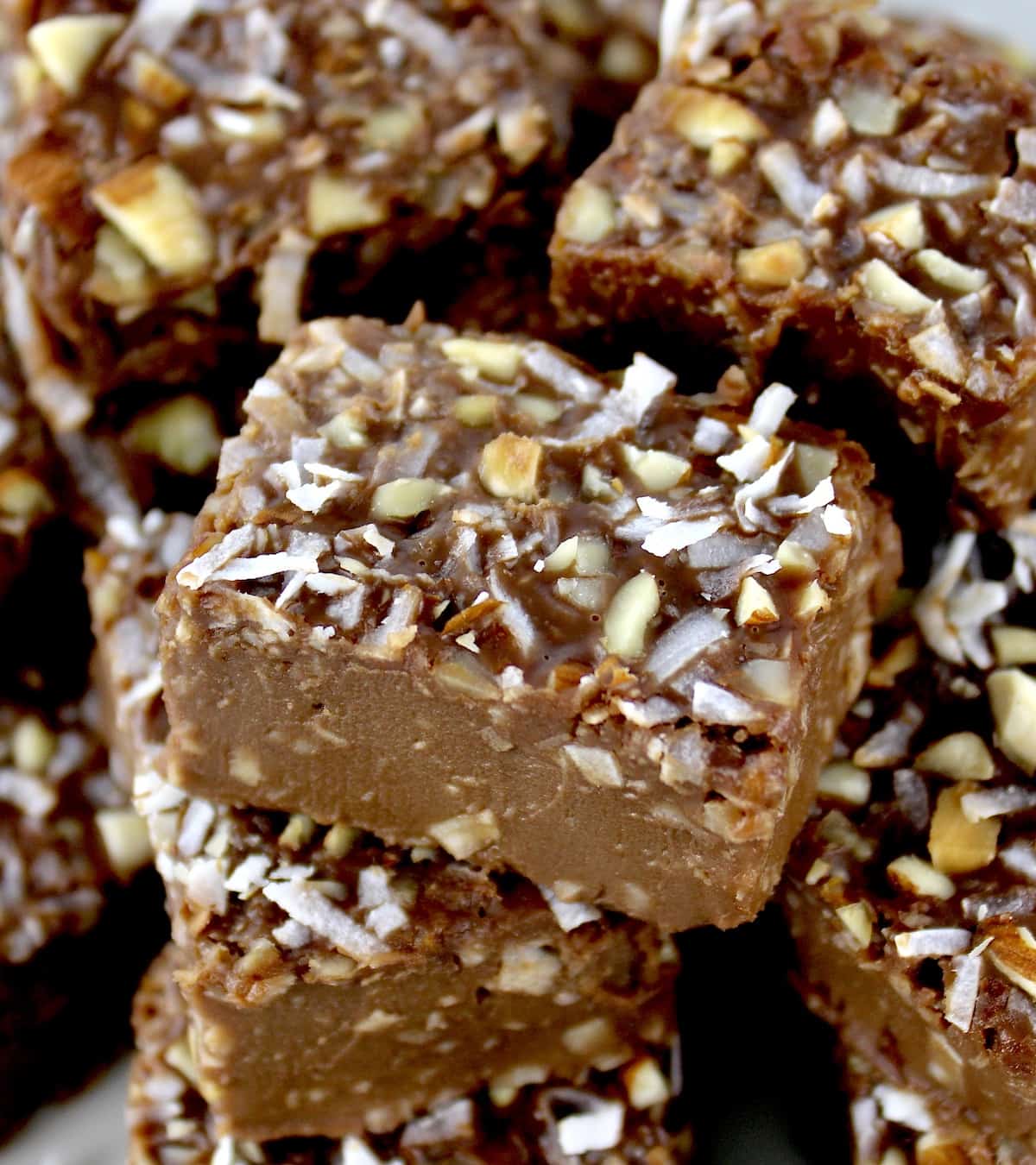 closeup of Keto Almond Joy Fudge stacked up